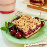 Cherry Crumble Cake with Vanilla Cream Sauce