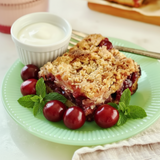 Cherry Crumble Cake with Vanilla Cream Sauce