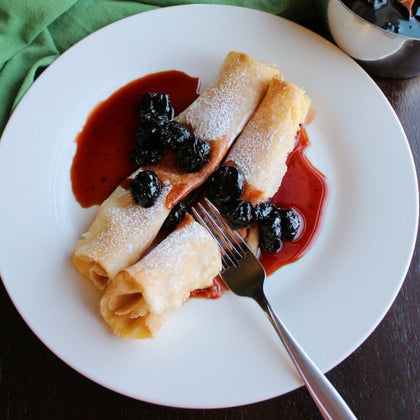 Lemon Ricotta Stuffed Crepes with Blueberry Syrup